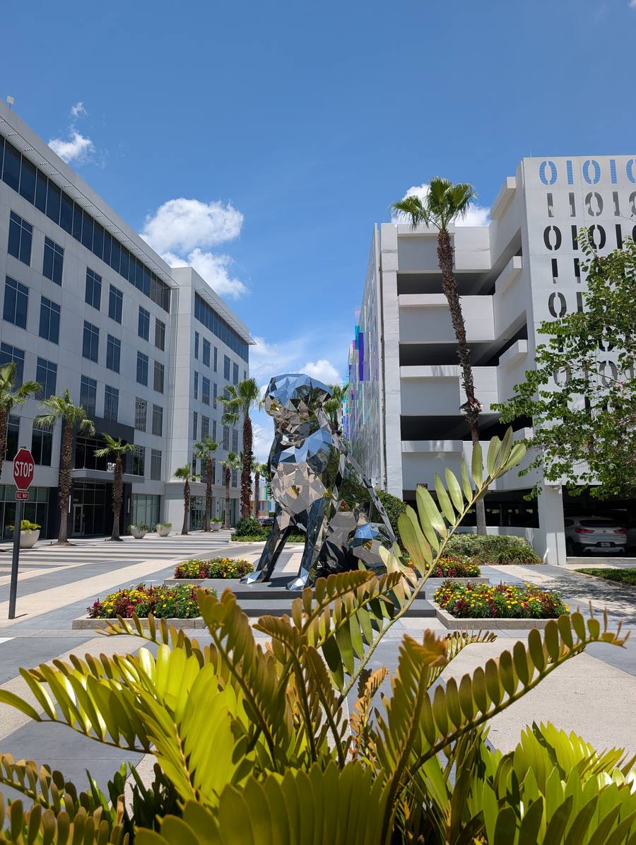 Chrome geometric dog sculpture at Lake Nona Innovation Way